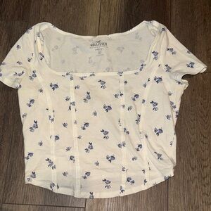 Hollister Cream Top with Blue Floral Design